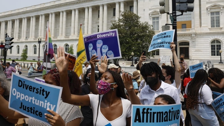 Supporters of affirmative action protest near the U.S. Supreme Court Building in Washington, D.C. In a 6-3 vote, Supreme Court Justices ruled that race-conscious admissions programs at Harvard and the University of North Carolina are unconstitutional, setting precedent for affirmative action in other universities and colleges. Getty Images