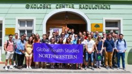 Global Health Studies students standing in front of a building